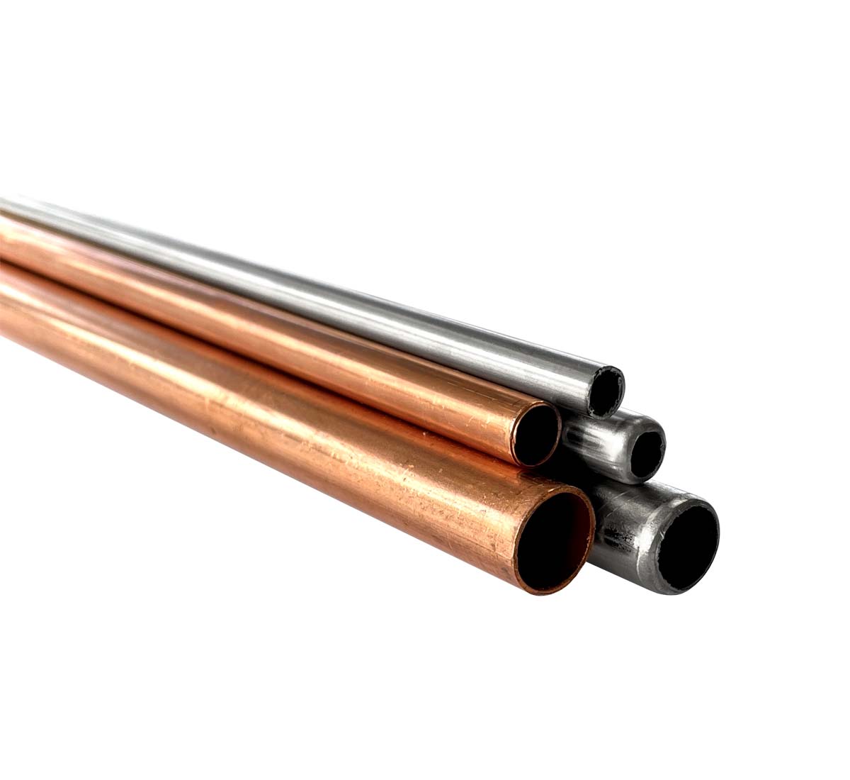 A close up picture of welded tubes in copper and stainless steel